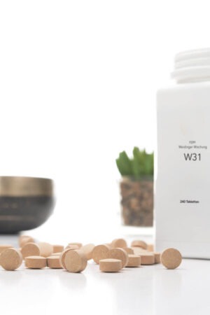 Weidinger W31 — geöffnete Dose mit ausgeschütteten Presslingen